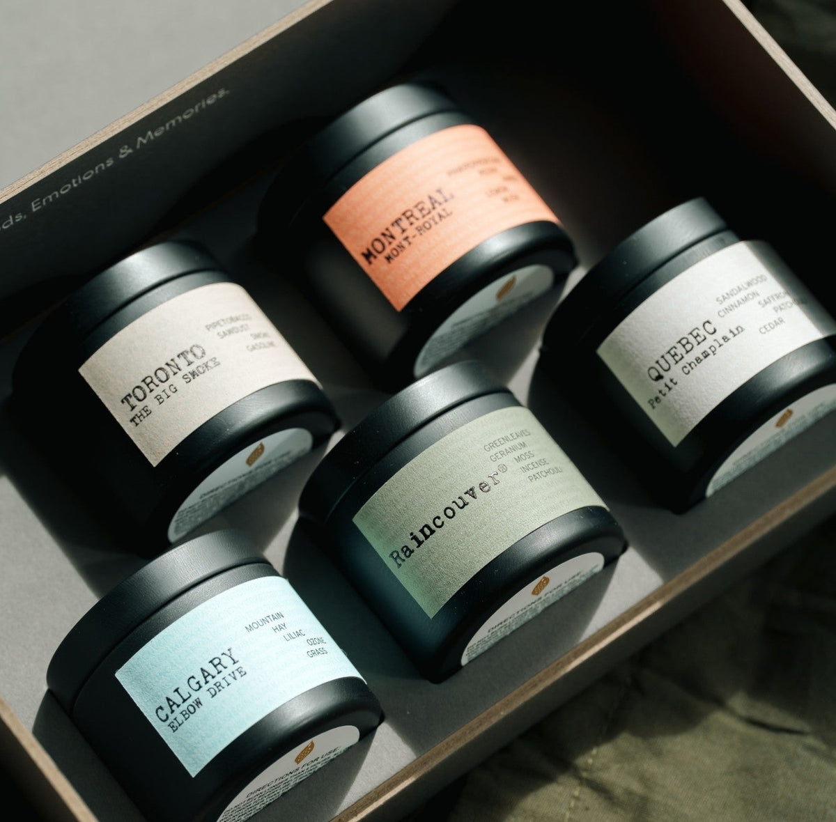 Ollie & Co. custom gift box with six city-themed candles in a wooden presentation box